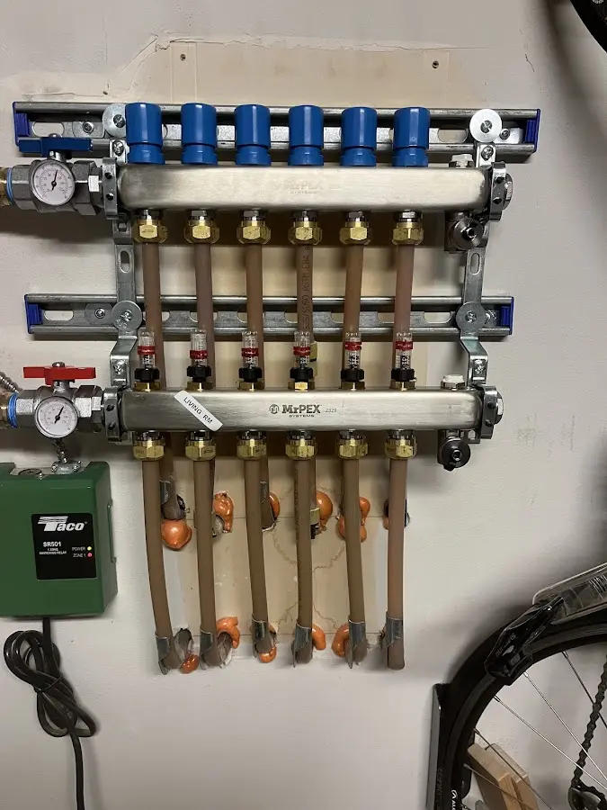 Plumber performing Water Heater Repair at a residential property in South Blooming Grove